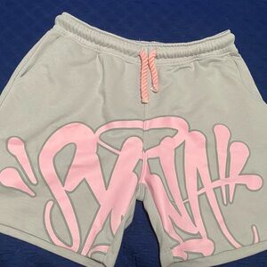Central Cee’s brand, Grey and pink shorts